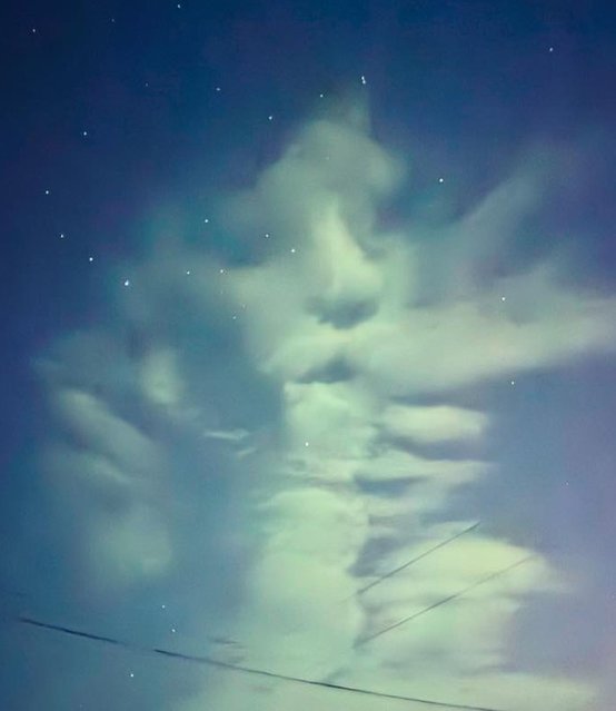 Orla Le Mahieu, a teaching assistant who rushed on September 9, 2024 out of her house in Belfast, Northern Ireland, to capture the northern lights, saw what looked like William Shakespeare staring down at her from the clouds. (Photo by Orla Le Mahieu/Kennedy News)