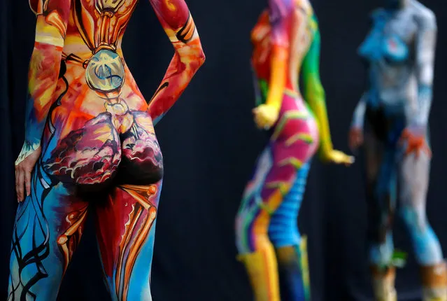 Models pose during the World Bodypainting Festival in Poertschach, Austria, July 1, 2016. (Photo by Heinz-Peter Bader/Reuters)