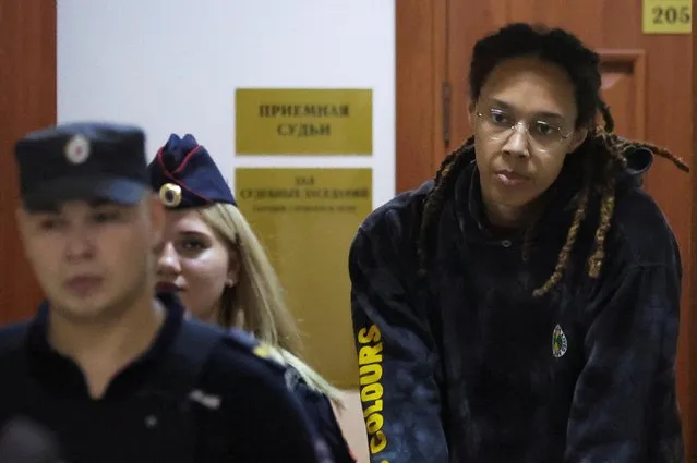 U.S. basketball player Brittney Griner, who was detained at Moscow's Sheremetyevo airport and later charged with illegal possession of cannabis, is escorted before a court hearing in Khimki outside Moscow, Russia on July 26, 2022. (Photo by Evgenia Novozhenina/Pool via Reuters)