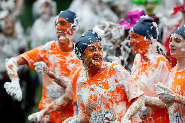 Students from St Andrews University are covered in foam as they take part in the traditional “Raisin Weekend” in the Lower College Lawn, at St Andrews in Scotland, Britain on October 23, 2017. (Photo by Russell Cheyne/Reuters)