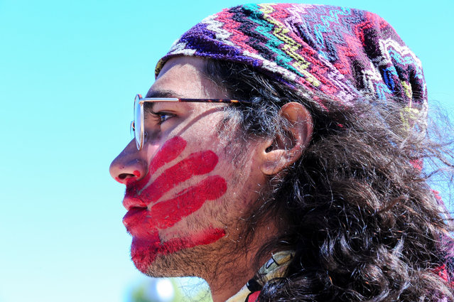 Tribal members gather at Wesley Bolin Memorial Plaza to honor 14-year-old Emily Pike before marching to the Arizona State Capitol on March 18, 2025. Pike's remains were found last month in Gila County, and the search for her killer continues. The rally draws attention to Arizona's crisis of missing and murdered Indigenous people. Demonstrators urge lawmakers to pass HB 2281, which would create an Amber Alert-style system for missing Indigenous individuals. (Photo by Eduardo Barraza/ZUMA Press Wire/Rex Features/Shutterstock)