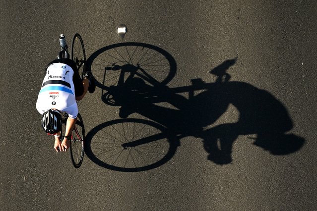 Competitors ride along St Kilda Beach during Ironman 70.3 Melbourne on November 10, 2024 in Melbourne, Australia. (Photo by Quinn Rooney/Getty Images)