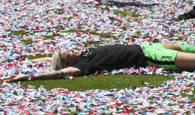 Houston Dash goalie Jane Campbell makes an angel in the confetti after beating the Chicago Red Stars  in the NWSL Challenge Cup at Rio Tinto Stadium in Sandy on Sunday, July 26, 2020. (Photo by Jeffrey D. Allred/Deseret News)