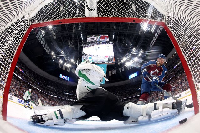 Valeri Nichushkin #13 of the Colorado Avalanche scores a goal past Jake Oettinger #29 of the Dallas Stars during the first period in Game Three of the First Round of the 2025 Stanley Cup Playoffs at Ball Arena on April 23, 2025 in Denver, Colorado. (Photo by Matthew Stockman/Getty Images/AFP Photo)