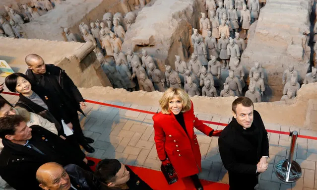 French President Emmanuel Macron and his wife Brigitte Macron visit the Museum of Terracotta Warriors and Horses of Emperor Qin Shihuang in Xi'an in northwestern China's Shaanxi Province, Monday, January 8, 2018. (Photo by Charles Platiau/Reuters)