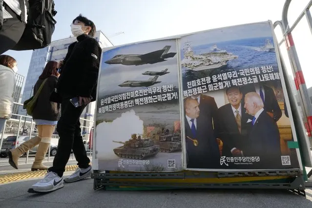 Posters are displayed to denounce policies of the United States and South Korean government on North Korea near the U.S. Embassy in Seoul, South Korea, Thursday, November 24, 2022. The powerful sister of North Korean leader Kim Jong Un made insult-laden threats against South Korea on Thursday for considering unilateral sanctions on the North, calling the South's new president and his government “idiots” and “a running wild dog gnawing on a bone given by the U.S.” The signs read “Withdrawal of the U.S. troops and suspension of nuclear war against North Korea”. (Photo by Ahn Young-joon/AP Photo)