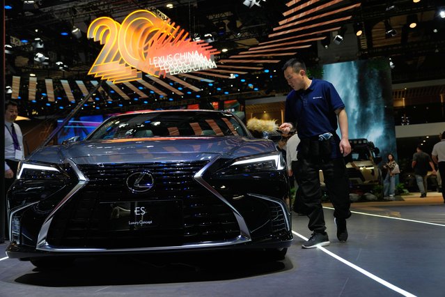 A polish brush is run by a Lexus ES Luxury Concept car at the Auto Show in Shanghai, Wednesday, April 23, 2025. (Photo by Ng Han Guan/AP Photo)