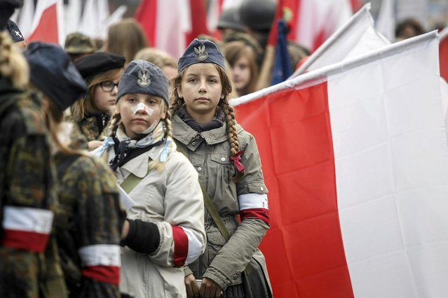 Youths parade wearing World War Two uniforms during the Independence Day celebrations in Gdansk November 11, 2014. (Photo by Lukasz Glowala/Reuters/Agencja Gazeta)