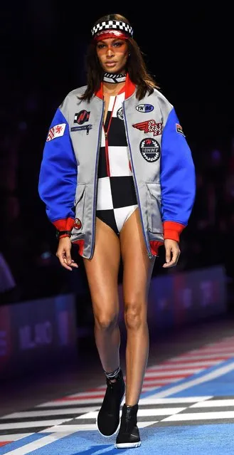 Puerto Rican model Joan Smalls presents a creation by Tommy Hilfiger during the Milan Fashion Week, in Milan, Italy, 25 February 2018. The Fall-Winter 2018/2019 Women's collections are presented at the Milano Moda Donna from 20 to 26 February. (Photo by Daniel Dal Zennaro/EPA/EFE)