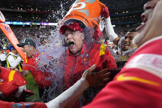 Kansas City Chiefs head coach Andy Reid is dunked after their win against the Philadelphia Eagles at the NFL Super Bowl 57 football game, Sunday, February 12, 2023, in Glendale, Ariz. Kansas City Chiefs defeated the Philadelphia Eagles 38-35. (Photo by Matt Slocum/AP Photo)