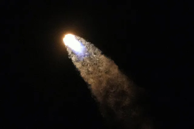 A SpaceX Falcon 9 rocket with the crew capsule Endeavour lifts off from pad 39A at the Kennedy Space Center in Cape Canaveral, Fla., Thursday, March 2, 2023. (Photo by John Raoux/AP Photo)