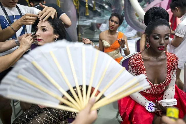 Contestants prepare to go on stage during the Miss International Queen 2015 transgender/transsexual beauty pageant in Pattaya, Thailand, November 6, 2015. (Photo by Athit Perawongmetha/Reuters)