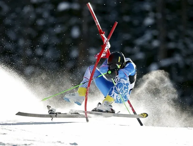 December 6, 2015; Beaver Creek, CO, USA; Andreas Zampa of Slovakia goes through a gate and loses a ski during first run of the men's giant slalom race in the FIS alpine skiing World Cup at Beaver Creek Mountain. (Photo by Erich Schlegel/USA TODAY Sports)