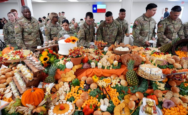 National guardsmen serving in Operation Lone Star take part in a Thanksgiving meal at a facility along the U.S.-Mexico border, Tuesday, November 26, 2024, in Eagle Pass, Texas. (Photo by Eric Gay/AP Photo)