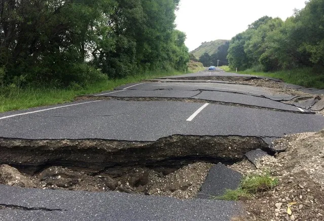 A fractured road caused by an earthquake stops vehicle access 70 kilometers south of Blenheim on New Zealand's South Island, November 14, 2016. (Photo by Anthony Phelps/Reuters)