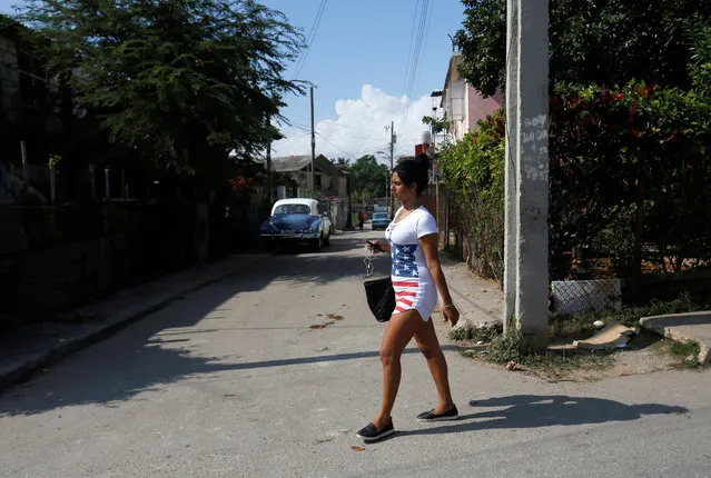 A woman walks in Jaimanitas where Cuba's former President Fidel Castro lived in Havana, Cuba, December 2, 2016. (Photo by Reuters/Stringer)