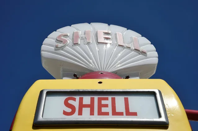 Shell fuel pumps are seen in the front garden of Manor Road Garage petrol station built in an art deco style. After the buisness closed the building decayed until being converted into flats in East Preston, West Sussex, Britain, April 28, 2016. (Photo by Toby Melville/Reuters)