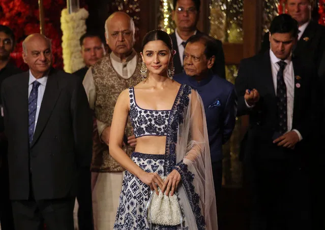 Actress Alia Bhatt arrives to attend the wedding ceremony of Isha Ambani, the daughter of the Chairman of Reliance Industries Mukesh Ambani, in Mumbai, India, December 12, 2018. (Photo by Francis Mascarenhas/Reuters)