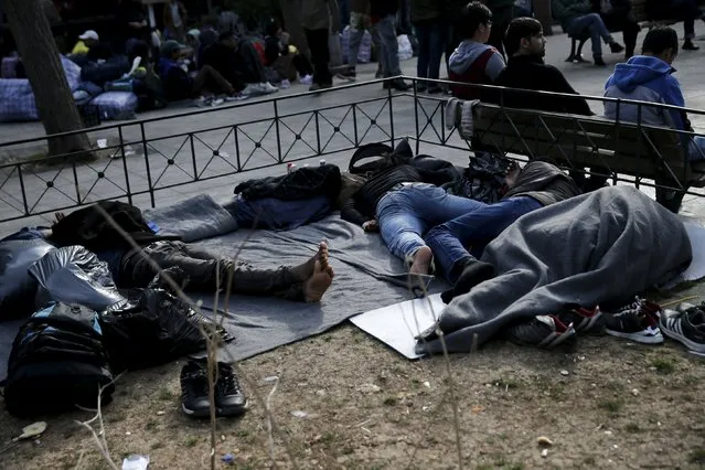 Migrants sleep on Victoria Square, where stranded refugees and migrants, most of them Afghans, find shelter in Athens, Greece, March 3, 2016. (Photo by Alkis Konstantinidis/Reuters)