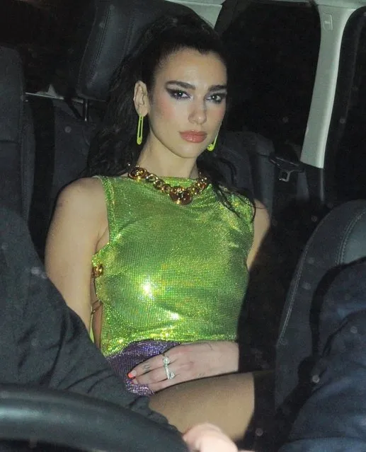 The British singer Dua Lipa is spotted with her entourage of security inside a vehicle outside the popular celebrity haunt, the Chiltern Firehouse in London, United Kingdom on October 16, 2021. (Photo by Backgrid USA)