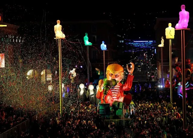 A float with a giant figure of U.S. President Donald Trump is paraded through the crowd during the 133rd Carnival parade, the first major event since the city was attacked during Bastille Day celebrations last year in Nice, France, February 11, 2017. (Photo by Eric Gaillard/Reuters)