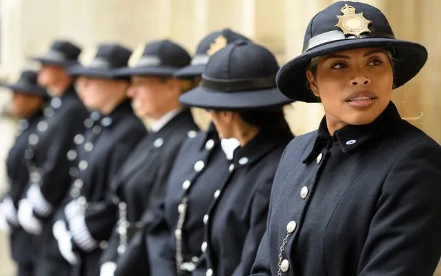 Serving police officers from the Metropolitan Police wear traditional uniforms at Westminster Abbey, ahead of a special service to mark 100 years since women joined the force, on May 17, 2019 in London, England. The Met has been celebrating the history of the role of women in the force with commemorative events, which culminated in the service at Westminster Abbey that mirrored an event that took place a century ago when a group of female officers appeared in uniform for the first time. (Photo by Leon Neal/Getty Images)
