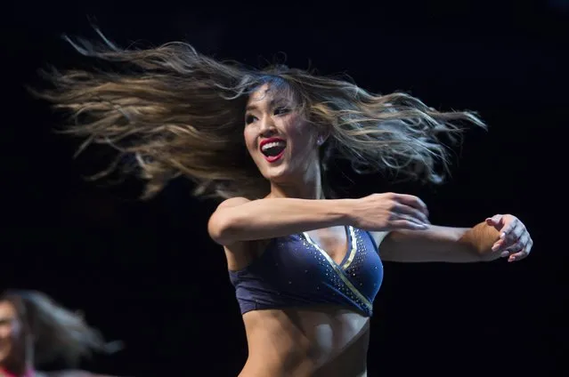 Los Angeles Rams cheerleader hopeful Michelle S. performs during the dance portion of the squad's final auditions in Los Angeles, California, USA, 17 April 2016. (Photo by Eugene Garcia/EPA)