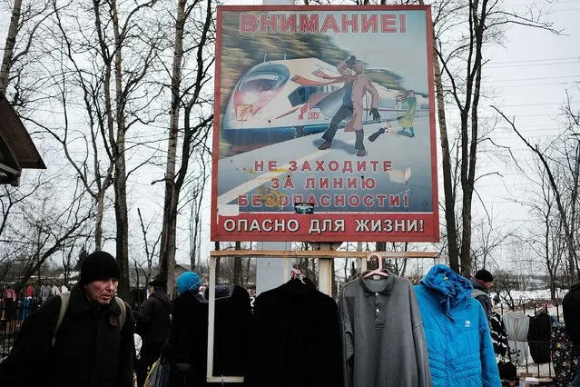 Russians, many of them poor, sell items at an outdoor flea market on the outskirts of Moscow on March 5, 2017 in Moscow, Russia. (Photo by Spencer Platt/Getty Images)