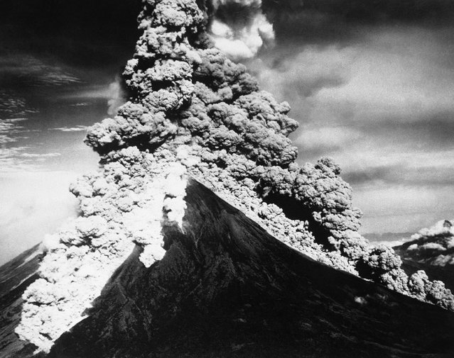 Inactive for 10years, Mayon volcano in Alday province near the city of Legaspi some 200 miles Southeast of Manila on September 7, 1943. Ashes from the eruptions settled over parts of four provinces and thousands of persons living near the base of the mountain were forced to flee. (Photo by AP Photo)