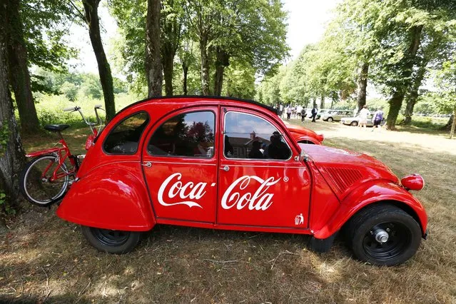 Very rare Citroen 2CV Coca-Cola with matching mounted bicycle exhibited at “Rally of the Century” for the Centenary of Citroen in commune La Ferte-Vidame, France on July 19, 2019. (Photo by Patrick Siccoli/Rex Features/Shutterstock)