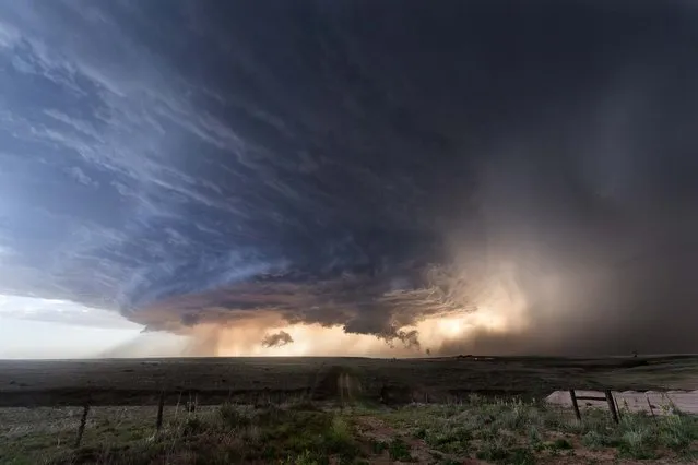 A supercell formation hangs over Texas skies in June 2013. (Photo by Mike Olbinski/Barcroft Media)