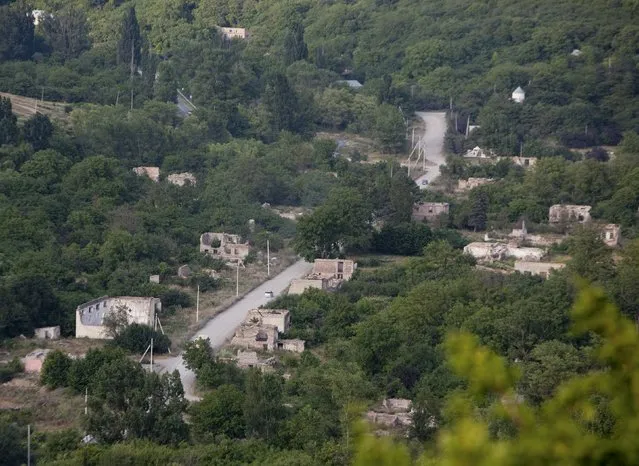 A general view shows the abandoned village of Awnew (Avnevi) near Tskhinvali, the capital of the breakaway region of South Ossetia, Georgia, July 4, 2015. (Photo by Kazbek Basaev/Reuters)