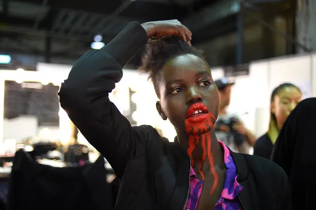 A model is prepared backstage for the show of Australian label Discount Universe during the Mercedes-Benz Fashion Week Australia in Sydney, Australia, 18 May 2016. The show runs from 15 to 20 May. (Photo by Tracey Nearmy/EPA)