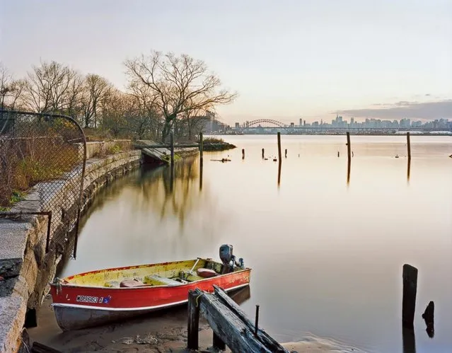 Beach at Dusk, North Brother Island, New York. With permission from the NYC Parks Department, Payne was one of a few photographers allowed on the island, and his photographs comprise a comprehensive record of the buildings and its evolving landscape over many seasons. His pictures invoke the former grandeur of the site, capturing hints of buried streets and infrastructure now reclaimed by nature, while also offering a unique glimpse into a city’s future without people. (Photo by Christopher Payne)