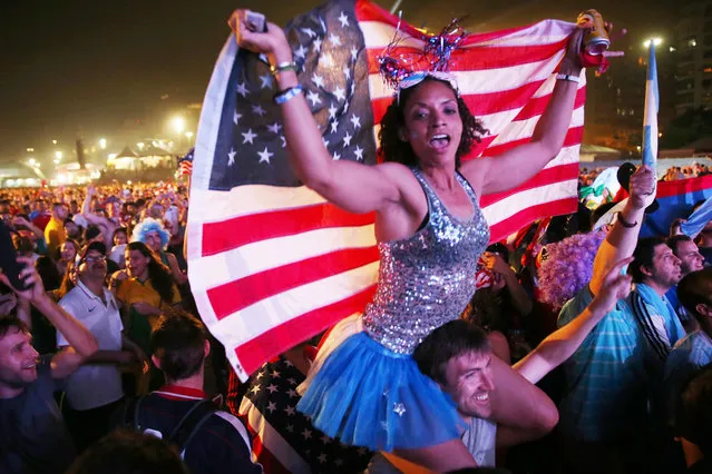 American soccer fans wait for their team to play against Ghana at the FIFA World Cup Fan Fest on Copacabana beach on June 16, 2014 in Rio de Janeiro, Brazil. The teams are playing on the fifth day of the World Cup tournament. (Photo by Joe Raedle/Getty Images)