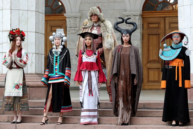 Models present creations during a fashion show of students of the Kyrgyz Academy of Design Art named after Sadykov at the Nomad Fashion Festival in Bishkek, Kyrgyzstan, 10 August  2023. The festival runs from 10 to 12 August 2023. (Photo by Igor Kovalenko/EPA/EFE)