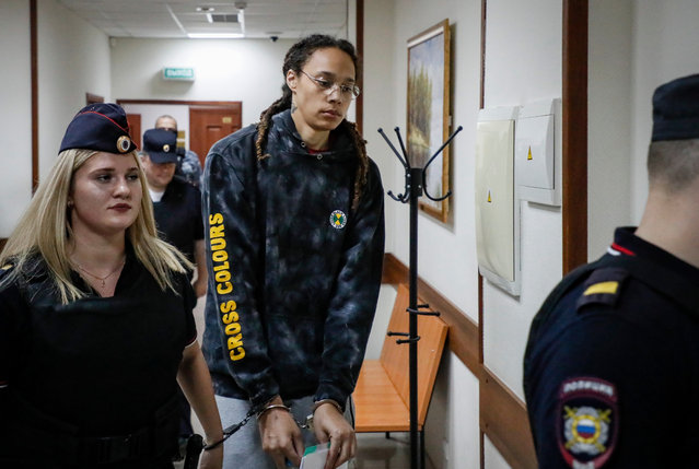 Two-time Olympic gold medalist and WNBA's Phoenix Mercury player Brittney Griner (C) is escorted to a courtroom for a hearing at the Khimki City Court outside Moscow, Russia, 26 July 2022. Griner, a World Champion player of the WNBA's Phoenix Mercury team was arrested in February at Moscow's Sheremetyevo Airport after some hash oil was detected and found in her luggage, for which she now could face a prison sentence of up to ten years. (Photo by Yuri Kochetkov/EPA/EFE)