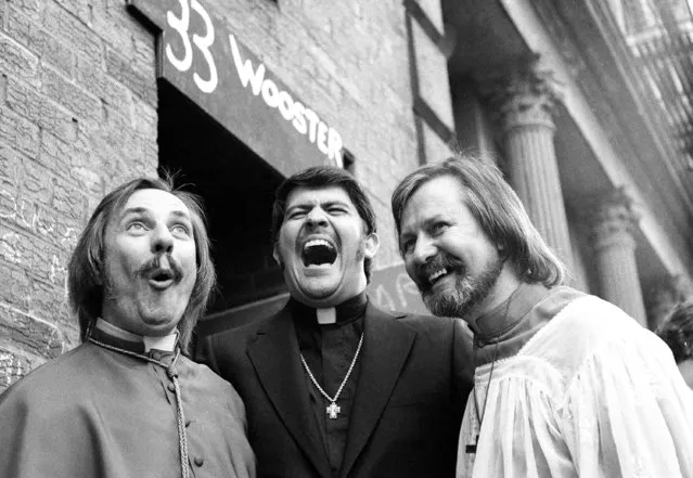 Father Troy Perry, center, who married Father Robert M. Clement, left and his partner John Noble, right, joke after the wedding at 33 Wooster Street, New York, July 18, 1971. (Photo by Ron Frehm/AP Photo)