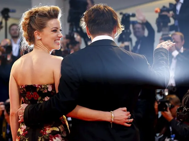 Actress Amber Heard and her husband Johnny Depp attend the red carpet event for the movie “The Danish Girl” at the 72nd Venice Film Festival, northern Italy September 5, 2015. (Photo by Stefano Rellandini/Reuters)