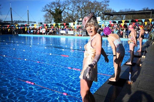 Competitors prepare to take part in a hat race during the Cold Water Swimming Championships at Tooting Bec Lido in London, Britain, on January 25, 2025. (Photo by Dylan Martinez/Reuters)