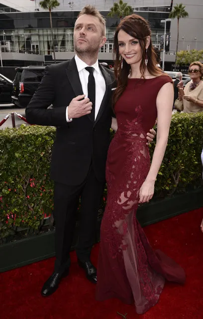 Chris Hardwick, left, and Lydia Hearst arrive at the Television Academy's Creative Arts Emmy Awards at Microsoft Theater on Saturday, September 12, 2015, in Los Angeles. (Photo by Dan Steinberg/Invision for the Television Academy/AP Images)