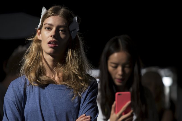 Models wait backstage before the Tommy Hilfiger Spring/Summer 2016 collection presentation during New York Fashion Week in New York, September 14, 2015. (Photo by Andrew Kelly/Reuters)