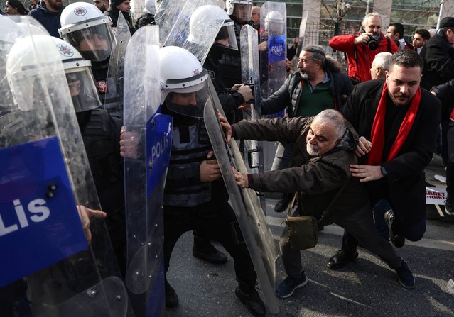 Turkish police officers block supporters of Istanbul Mayor Ekrem Imamoglu (not pictured) as they gather in front of the Istanbul Courthouse, in Istanbul, Turkey, 31 January 2025. Imamoglu is set to testify in court as part of a new investigation launched against him for 'attempting to influence judicial proceedings' following his comments on probes involving CHP-run municipalities earlier in January, the Istanbul Chief Public Prosecutor's Office said. (Photo by Erdem Şahin/EPA/EFE)
