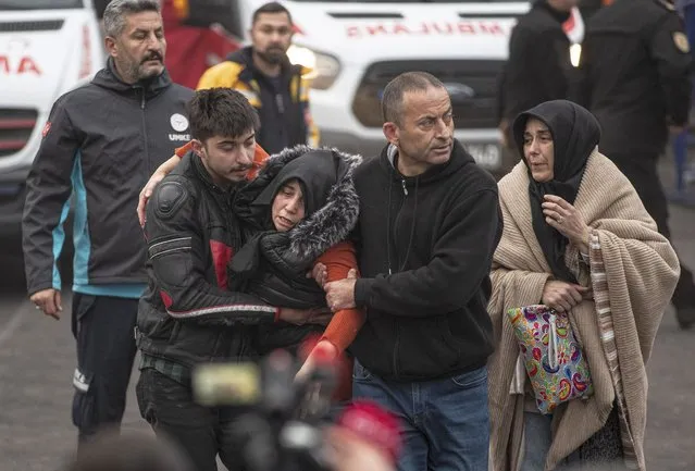 A relative of a miner reacts at the explosion site after a blast occurred at a coal mine in Bartin, Turkey, 15 October 2022. According to Turkish Health Minister Fahrettin Koca, at least 28 people died in the blast, and 11 people were wounded. (Photo by Erdem Sahin/EPA/EFE)