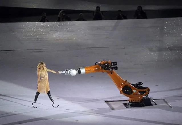 2016 Rio Paralympics, Opening ceremony, Maracana, Rio de Janeiro, Brazil on September 7, 2016. Amy Purdy interacts with a robotic arm during the opening ceremony. (Photo by Sergio Moraes/Reuters)