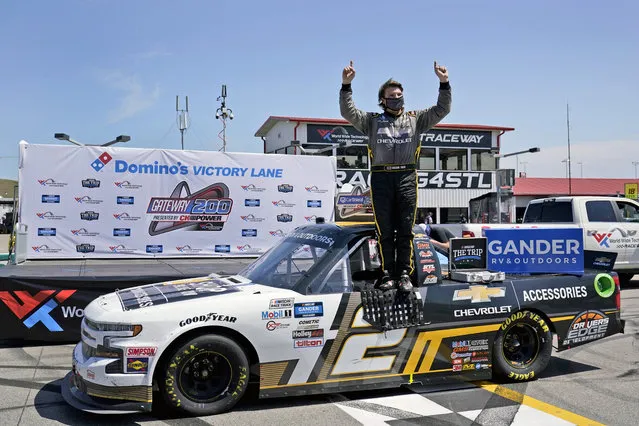 Sheldon Creed celebrates after winning a NASCAR Truck Series race at World Wide Technology Raceway on Sunday, August 30, 2020, in Madison, Ill. (Photo by Jeff Roberson/AP Photo)