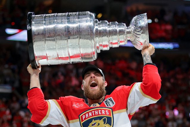 Florida Panthers left wing A.J. Greer (10) hoists the Stanley Cup after winning game six of the 2025 Stanley Cup Final against the Edmonton Oilers at Amerant Bank Arena in Sunrise, Florida on June 18, 2025. (Photo by Sam Navarro/Reuters)