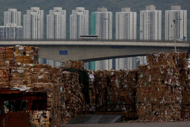 Tonnes of waste paper to be shipped to mainland China are piled up at a dock in Hong Kong, China September 15, 2017. (Photo by Bobby Yip/Reuters)