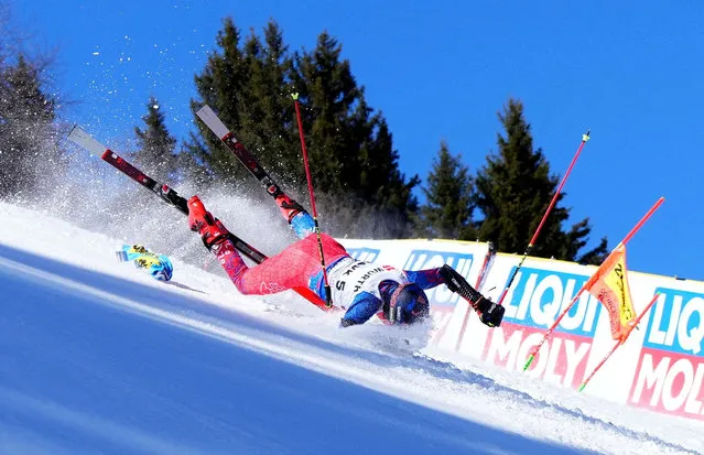 Slovakia's Martin Hyska takes a fall during the race against France's Alexander Schimid at FIS Alpine Ski World Cup in Meribel, France on February 14, 2023. (Photo by Aleksandra Szmigiel/Reuters)