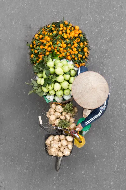 “I once talked to a vendor after she sold me bad fruit. She said the man at the market had sold it to her, but she needed to get rid of it otherwise she wouldn’t make a profit during the day”. (Photo by Loes Heerink/The Guardian)